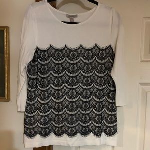 White and black sweater